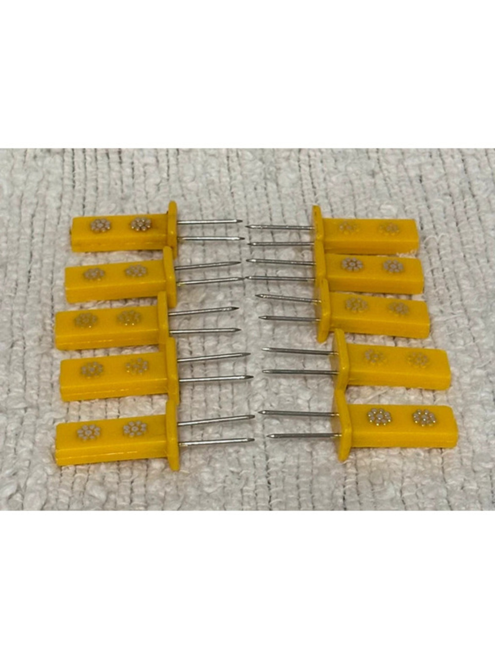 vintage yellow plastic and metal corn on the cob holders
